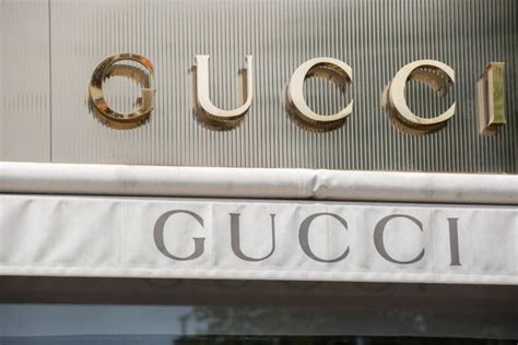 gucci brand owner country|who bought out gucci.